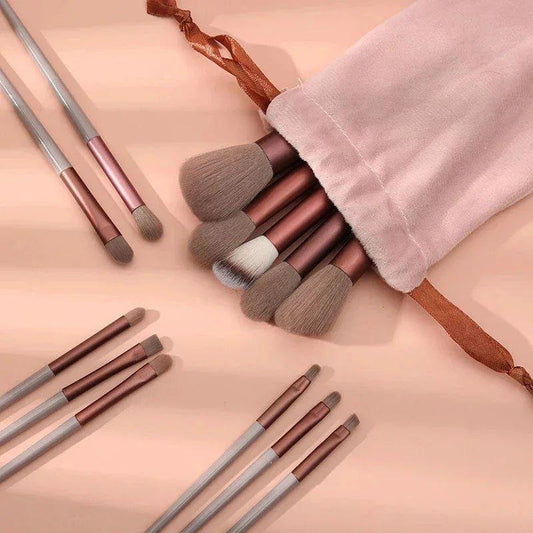 Rose gold makeup brushes with soft bristles in pink velvet pouch, beauty tools for women's fashion