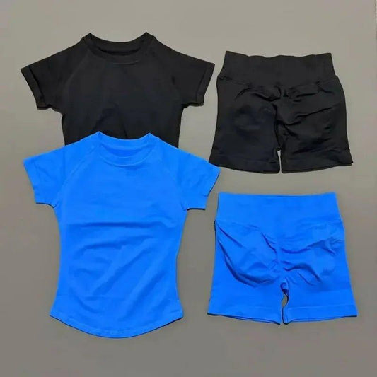 Women's black and blue short sleeve tops with matching biker shorts, fitness activewear sets
