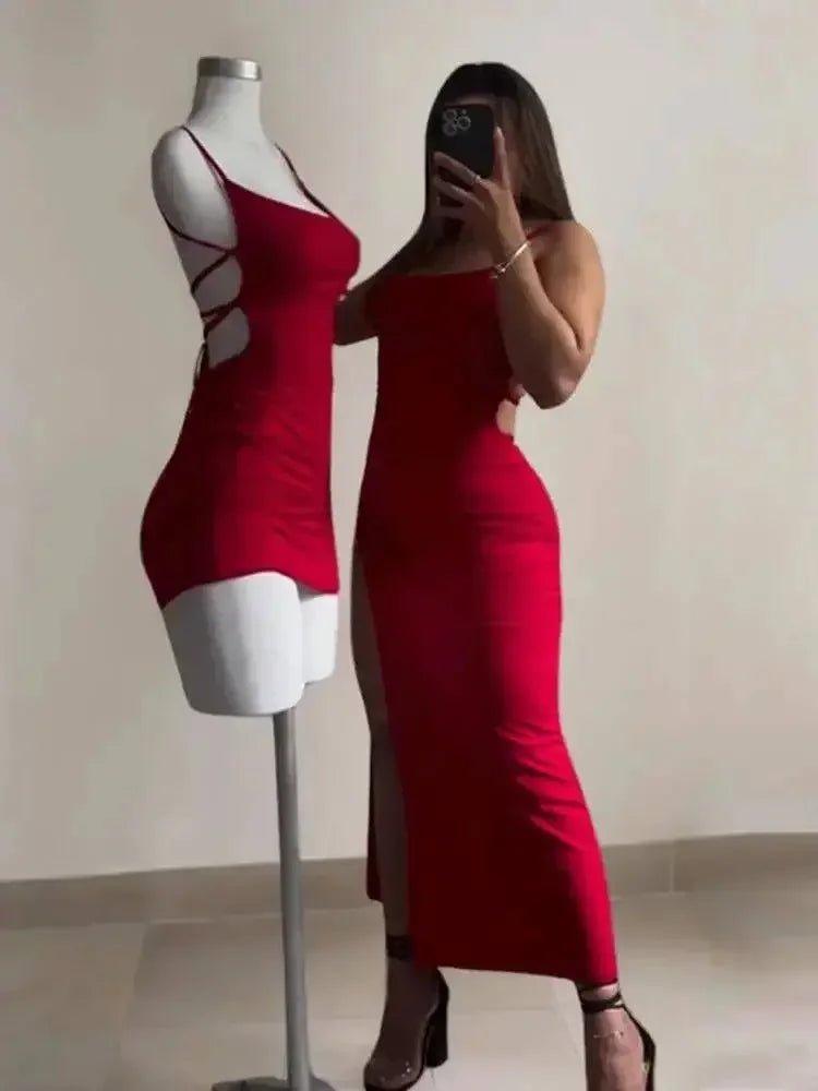 Woman in red bodycon dress with side slit, matching mannequin, fashion outfit