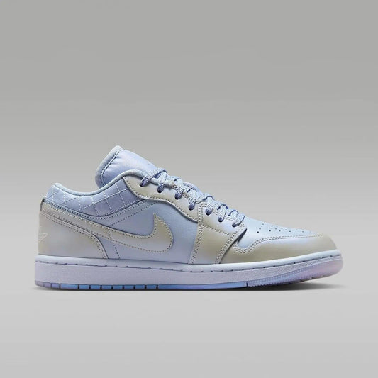 Light blue and white Nike Air Jordan 1 low sneaker with quilted detailing and pastel sole