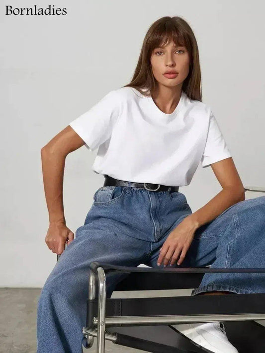Woman in white t-shirt and high-waist denim jeans, casual fashion outfit