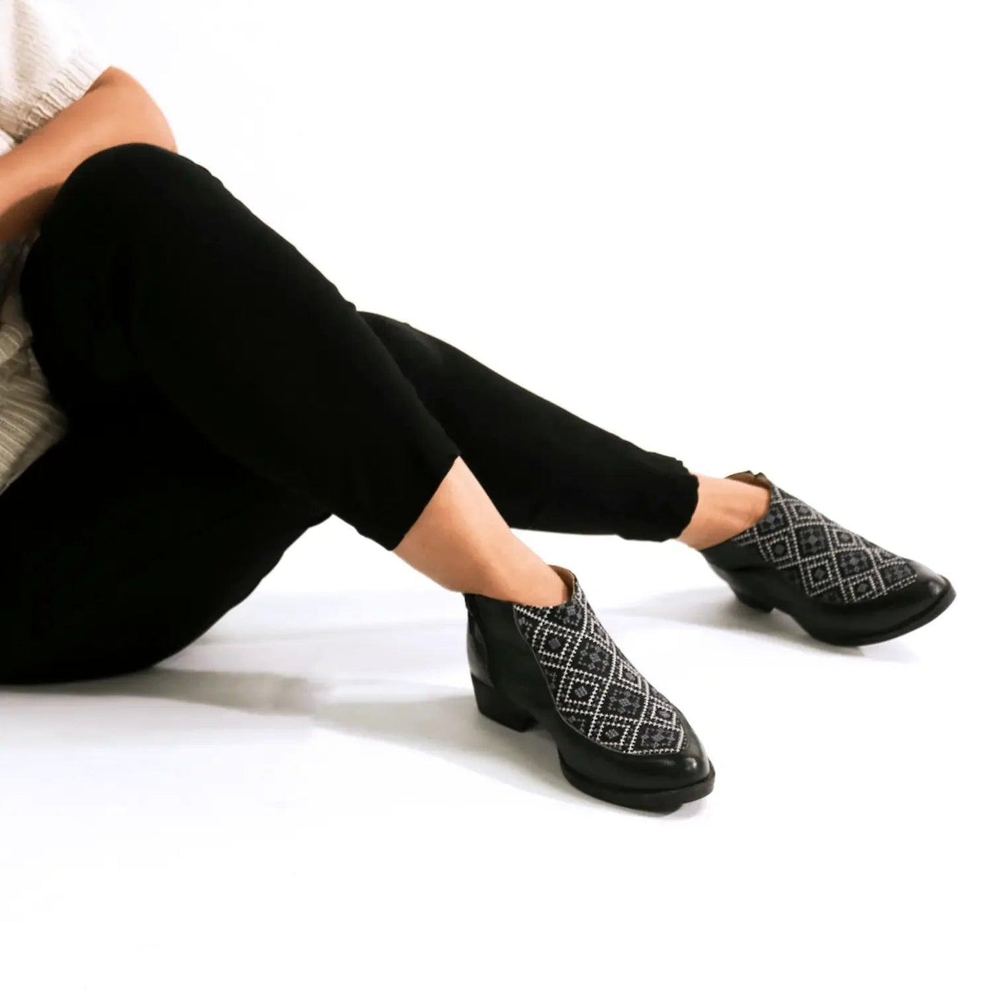 Black ankle boots with geometric pattern, stylish women's fashion footwear