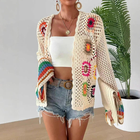 Boho crochet cardigan with floral patterns, paired with denim shorts and white top for women's fashion