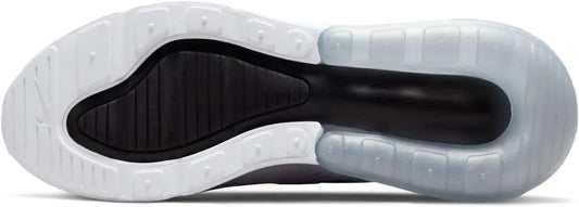 White and black women's sneaker sole with cushioned design for comfort and style