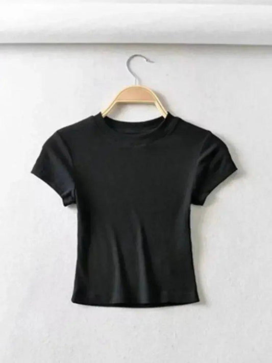 Black women's short sleeve crop top on wooden hanger, minimalist fashion