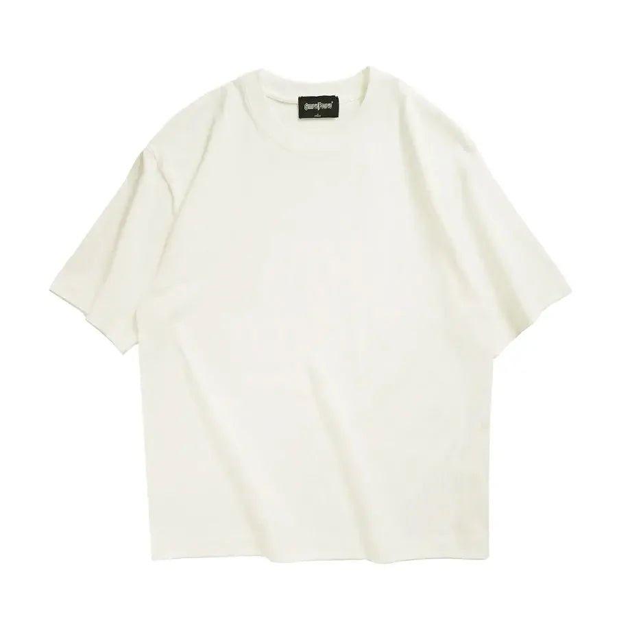 Cream oversized women's fashion t-shirt with brand tag, minimalist style for casual wear