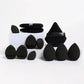 Black makeup sponges set with velvet pouches for flawless beauty application