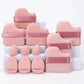Pink makeup sponges and beauty blenders with ribbon straps, ideal for flawless foundation application