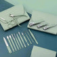 Green manicure set with nail clippers, scissors, and tools in portable cases for beauty and fashion