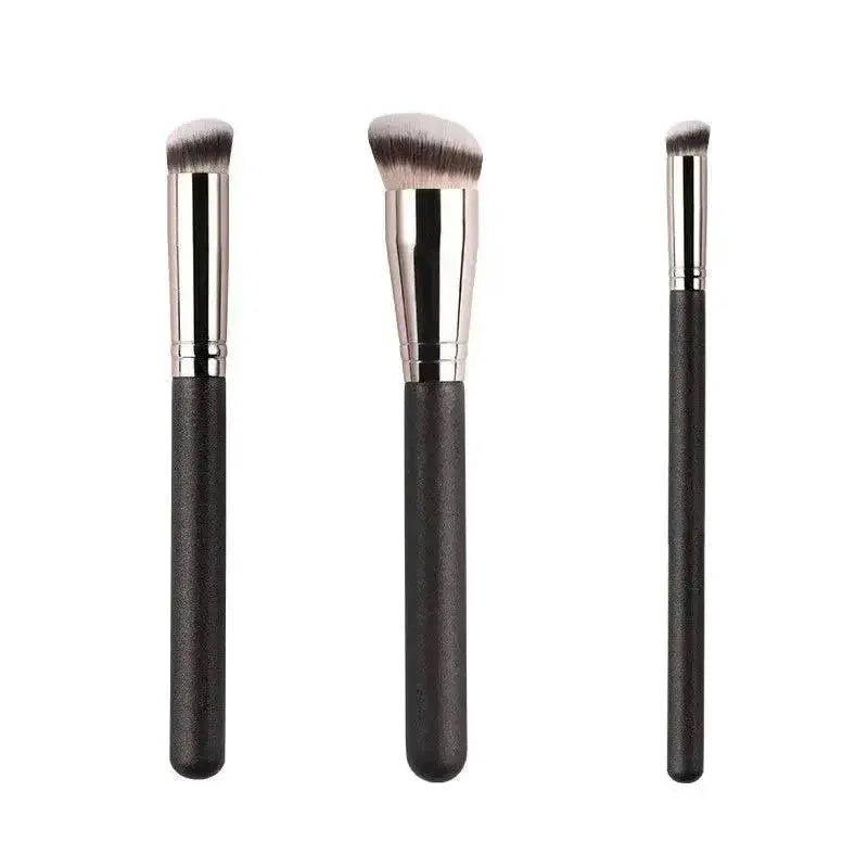 Set of 3 black-handled makeup brushes for face and eye application, perfect for women's beauty routines