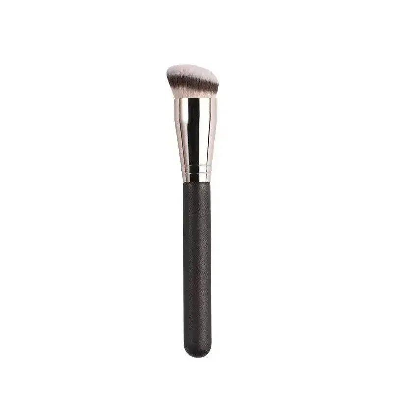 Black handle makeup brush with angled bristles for face contouring and blending
