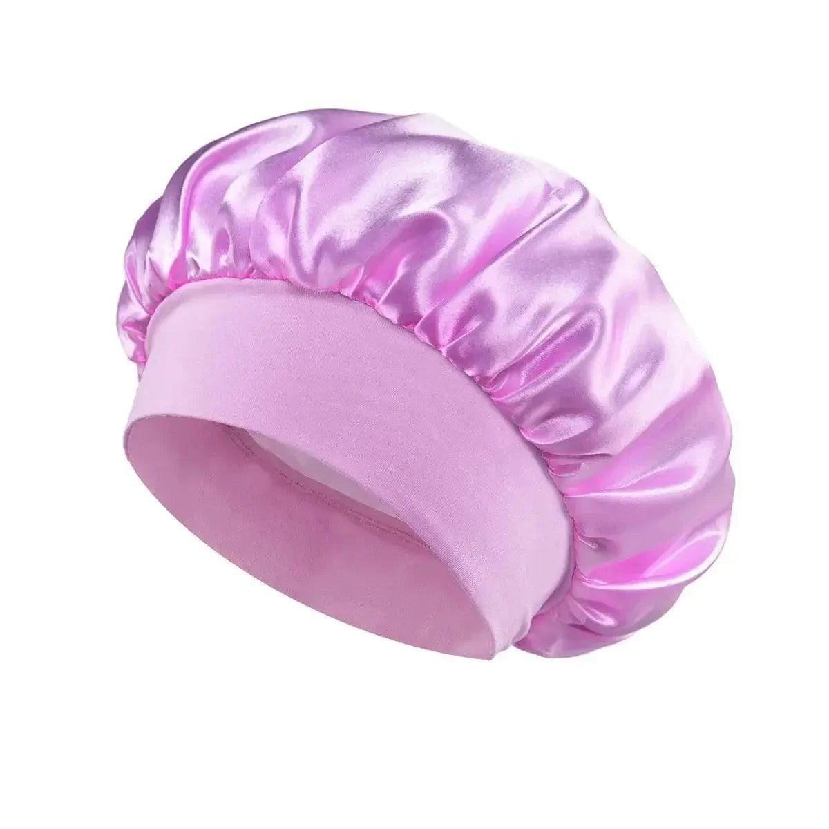 Pink satin sleep cap for women, soft hair care accessory