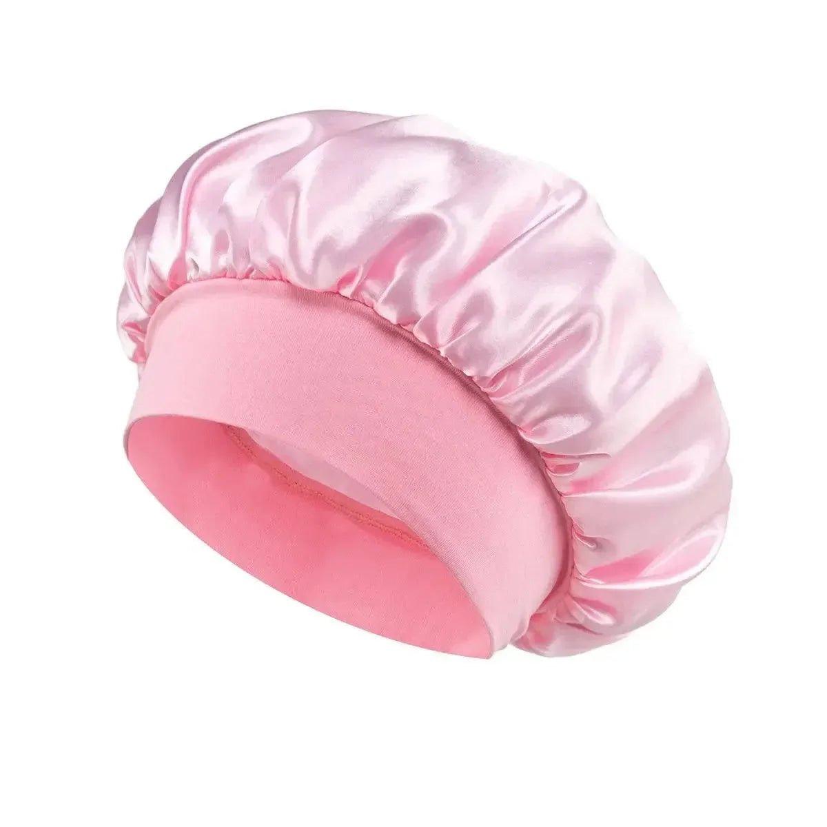 Pink satin sleep bonnet for women, soft hair care accessory, beauty and fashion essential