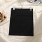 Black ribbed mini skirt on pearl hanger, women's fashion, soft fabric, stylish outfit essential