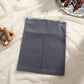 Gray ribbed mini skirt on pearl hanger, women's fashion, soft texture, stylish outfit accessory