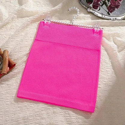 Bright pink ribbed mini skirt on pearl hanger, women's fashion