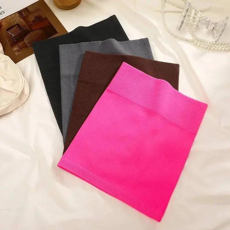 Women's ribbed knit tops in pink, brown, gray, and black — stylish fashion essentials