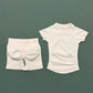 White women's fashion set: short-sleeve top and high-waist shorts with front knot detail