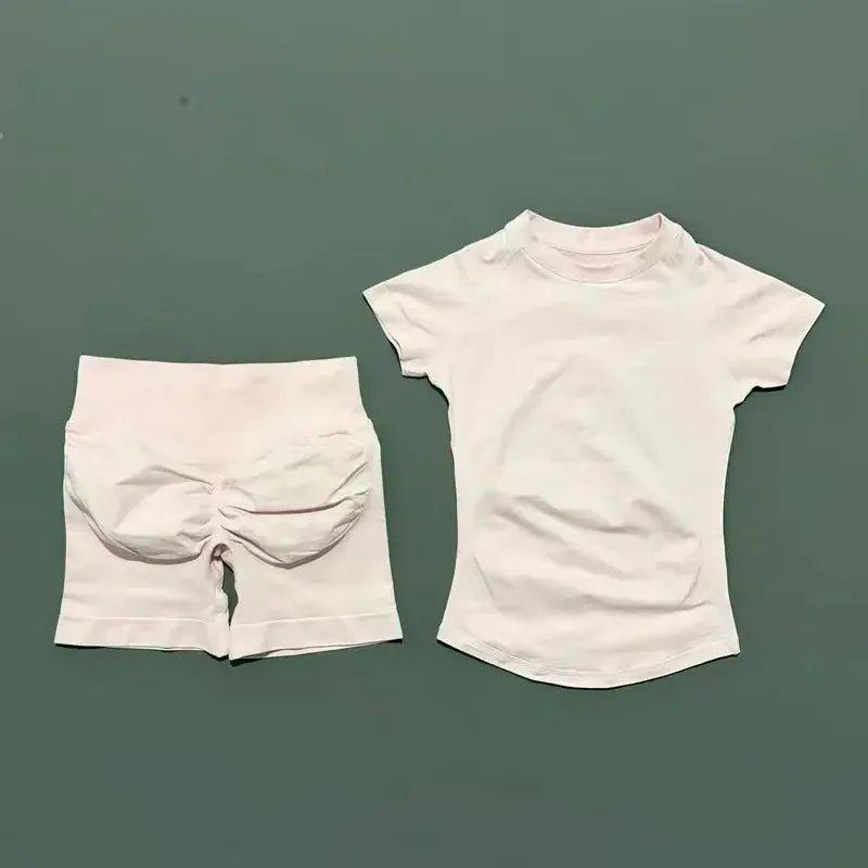 White women's fashion set: short-sleeve top and high-waist shorts with front knot detail
