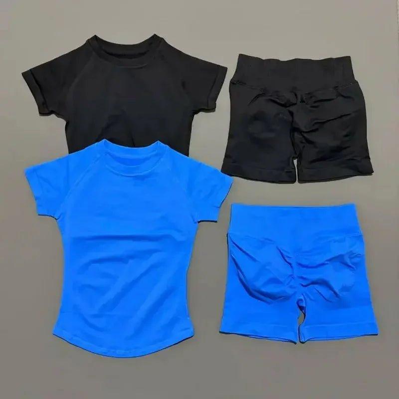 Women's black and blue short sleeve tops with matching biker shorts, fitness activewear sets