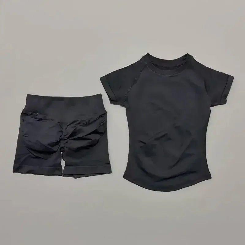 Black women's athletic set: short sleeve top and high-waisted shorts for fitness or casual wear