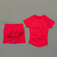 Red women's fashion set: short-sleeve top and high-waist shorts for casual or workout wear