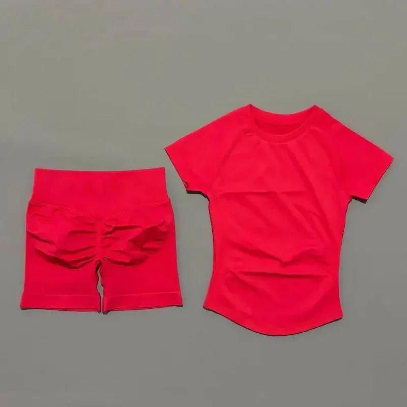 Red women's fashion set: short-sleeve top and high-waist shorts for casual or workout wear