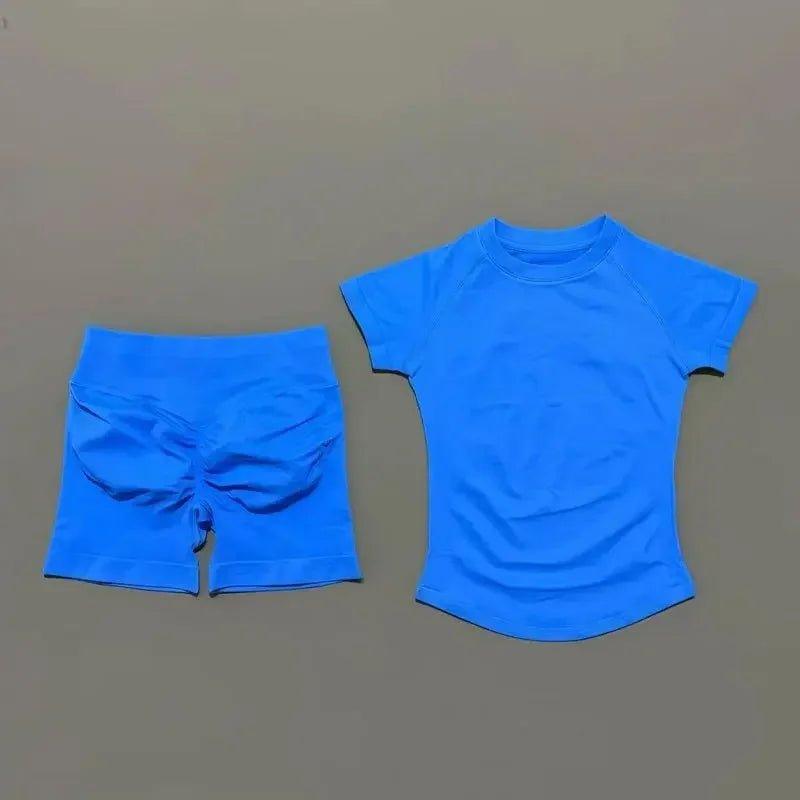 Bright blue women's athletic set: short-sleeve top and high-waisted shorts for fitness or casual wear