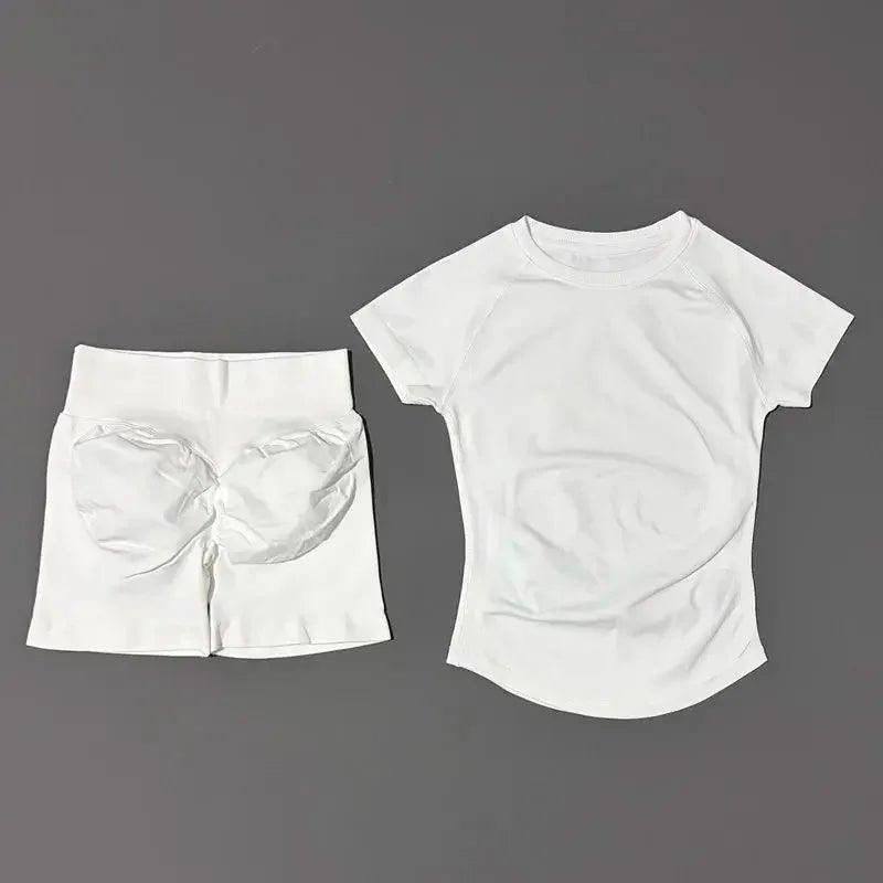 White women's athletic set: short-sleeve top and padded shorts for fitness or casual wear