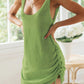 Green knit tank dress with side ruching, perfect for summer fashion and casual wear.