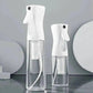 Clear spray bottles with white nozzles for beauty and fashion use