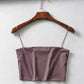 Mauve satin crop top with thin straps on wooden hanger, women's fashion