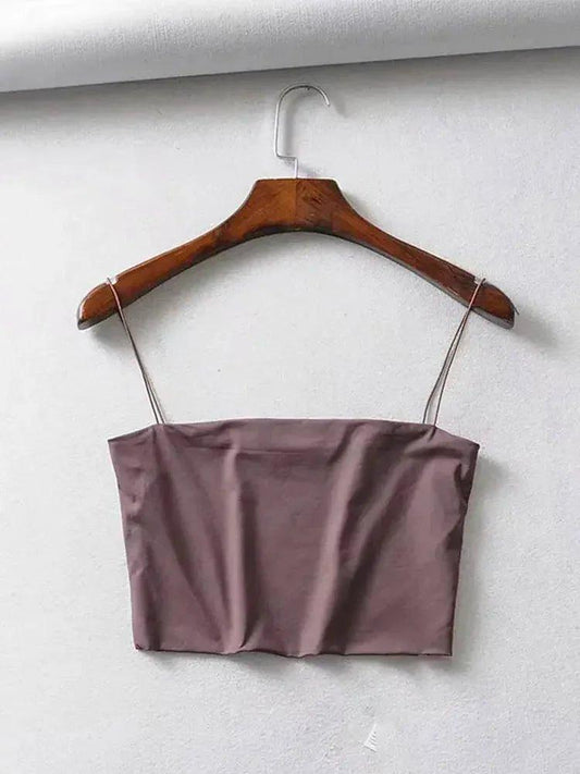 Mauve satin crop top with thin straps on wooden hanger, women's fashion