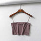 Mauve satin crop top with thin straps on wooden hanger, women's fashion