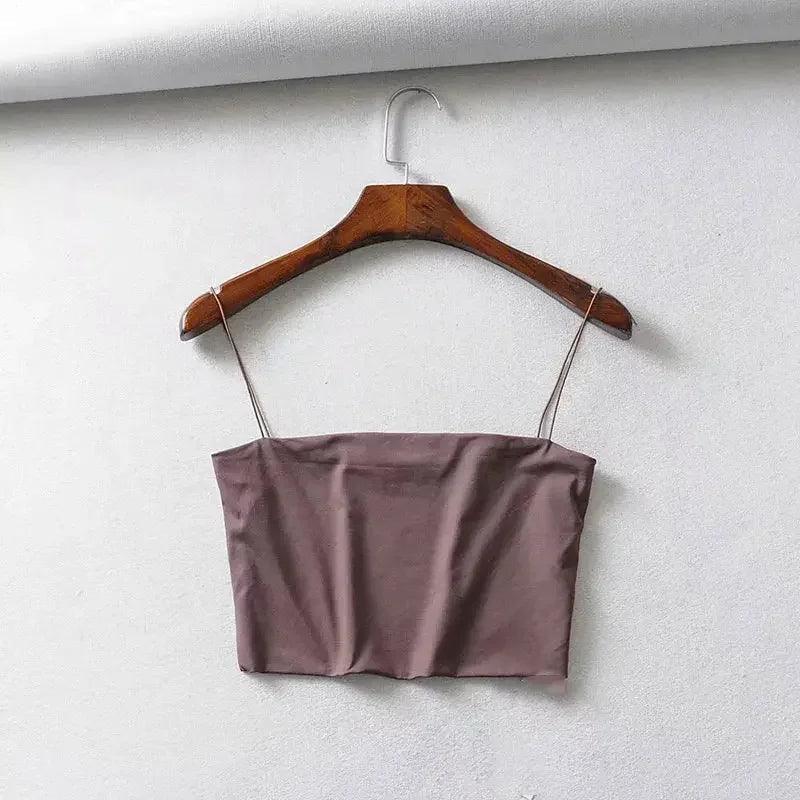 Mauve satin crop top with thin straps on wooden hanger, women's fashion