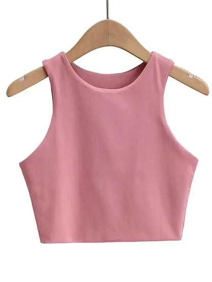 Pink sleeveless crop top for women, stylish fashion tank top on wooden hanger