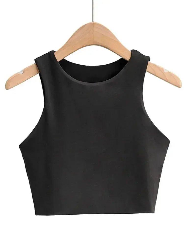 Black sleeveless crop top for women, stylish fashion essential on wooden hanger