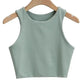 Mint green sleeveless crop top for women, stylish summer fashion on wooden hanger