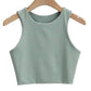 Mint green sleeveless crop top for women, stylish fashion tank top on wooden hanger