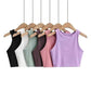 Women's sleeveless crop tops in multiple colors on wooden hangers, fashion basics