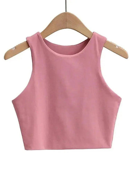 Pink sleeveless crop top for women, stylish fashion tank top on wooden hanger
