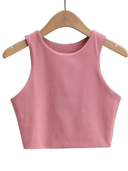 Pink sleeveless crop top for women, stylish fashion tank top on wooden hanger