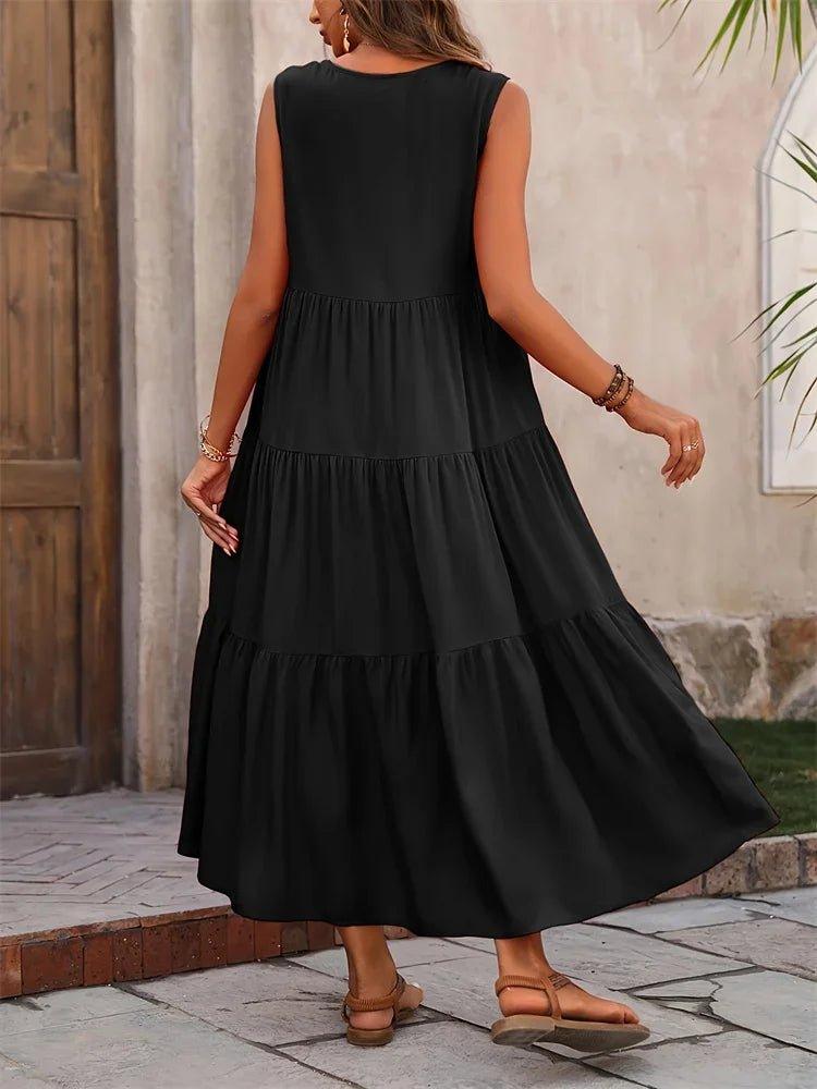 Black sleeveless tiered maxi dress for women, perfect for summer fashion and casual elegance.
