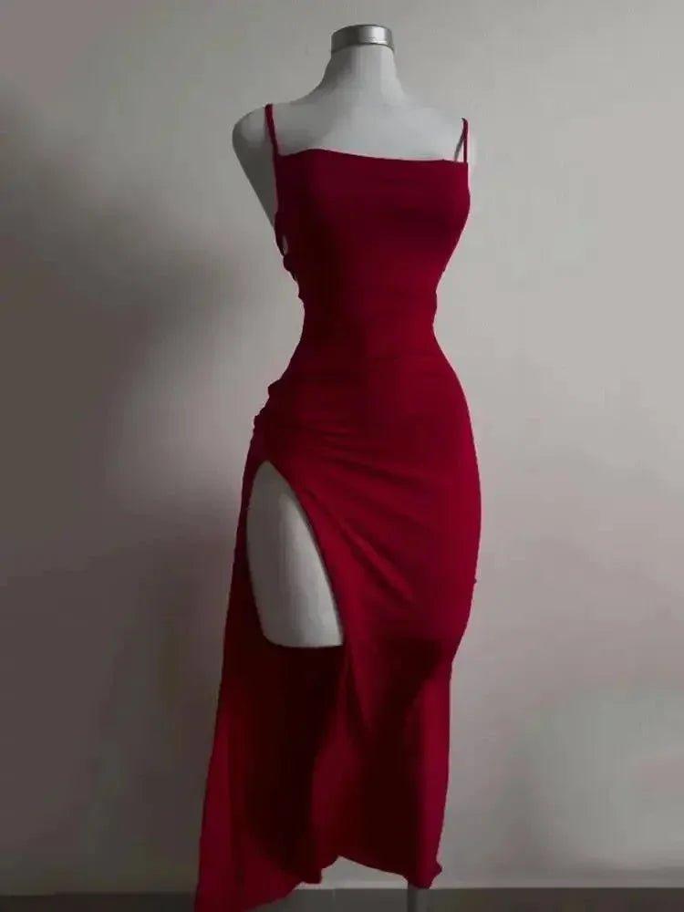 Red evening dress with side slit and thin straps, women's fashion
