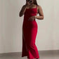 Red sleeveless midi dress with side slit, perfect for women’s fashion and evening wear