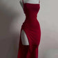 Red evening dress with side slit and thin straps, elegant women's fashion