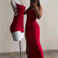 Woman in red bodycon dress with side slit, matching mannequin, fashion outfit