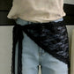 Black lace waist wrap tied over light wash jeans, fashion accessory for women