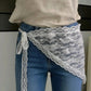White lace waist wrap with floral pattern, tied over jeans for women's fashion