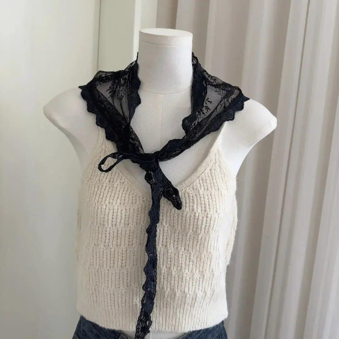 Black lace collar accessory on cream knit top, stylish women's fashion